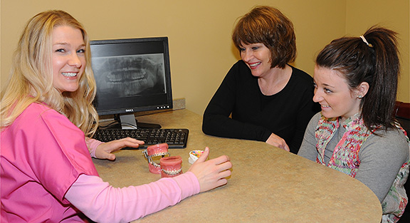 Dr. Sullivan doing an orthodontic consultation
